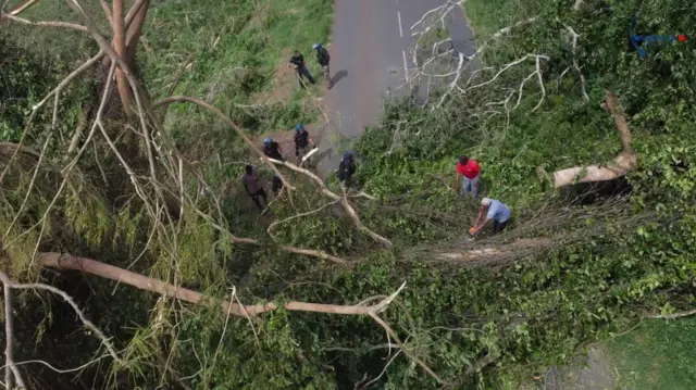 French Gendarmerie forces clear a road in the aftermath of Cyclone Chido, in Mayotte, France
