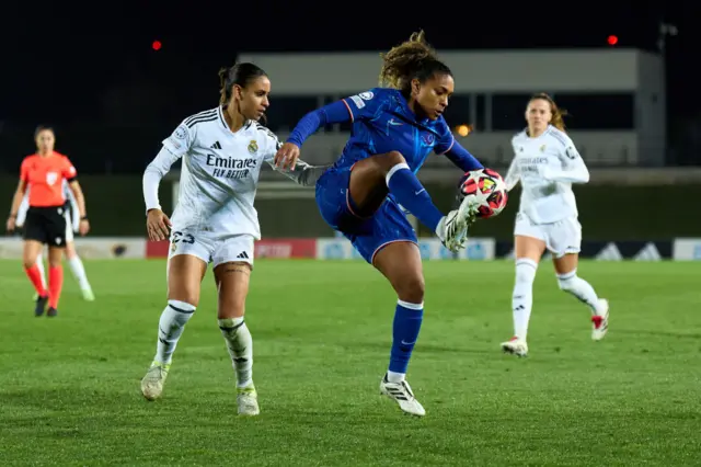 Catarina Macario of Chelsea FC controls the ball whilst under pressure from Maelle Lakrar