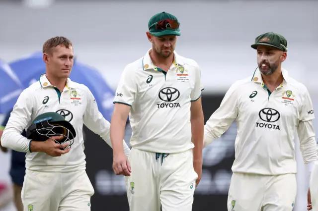 Josh Hazlewood walks off with a calf injury