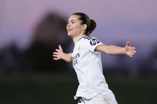 Signe Bruun celebrates a goal by reaching her arms wide