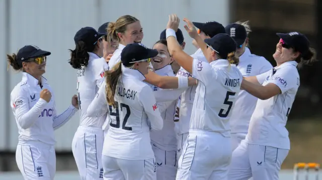 England players celebrate victory