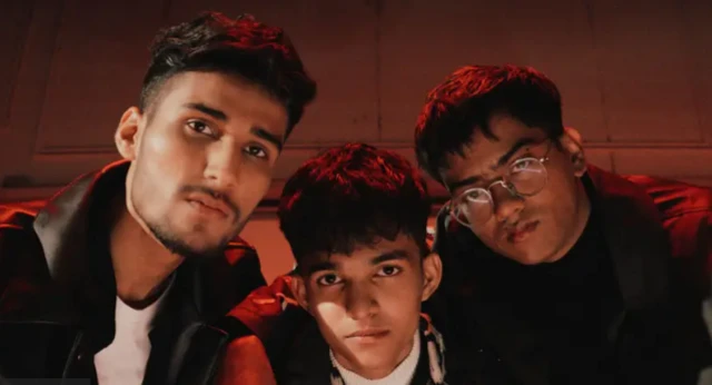 Usama Ali, Ahad Khan and Raffey Anwar looking at the camera, all with short dark hair, Raffey on the right wearing glasses