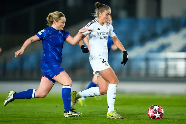 Filippa Angeldahl of Real Madrid CF battles for the ball with Erin Cuthbert