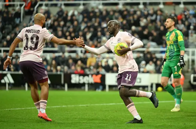 Yoane Wissa of Brentford celebrates scoring his team's first goal