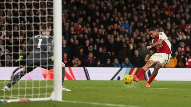 Arsenal's Gabriel Jesus scores their second goal past Crystal Palace's Dean Henderson