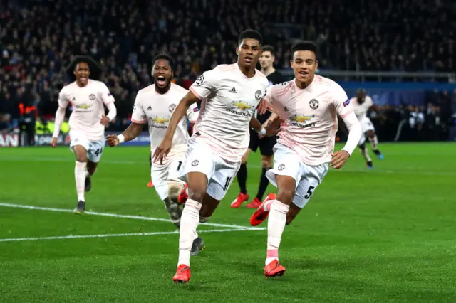 Marcus Rashford scores a late penalty against PSG