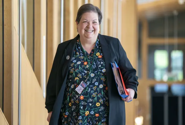 Scottish Labour's deputy leader Jackie Baillie walks up the corridor