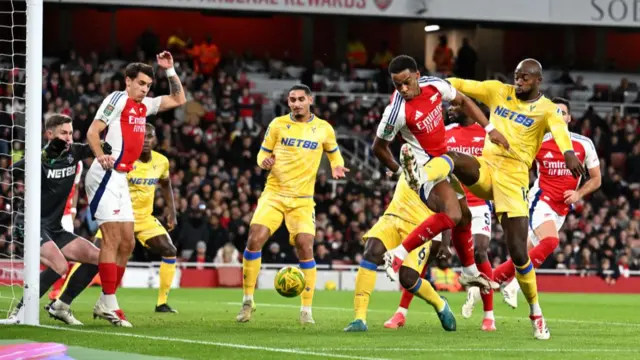 Jurrien Timber of Arsenal has a headed shot whilst under pressure from Jean-Philippe Mateta of Crystal Palace