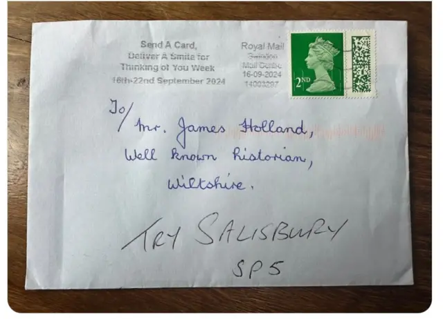 A white envelope with a second class stamp, with the writing: Mr James Holland, Well known historian, Wiltshire and below in capitals: TRY SALISBURY