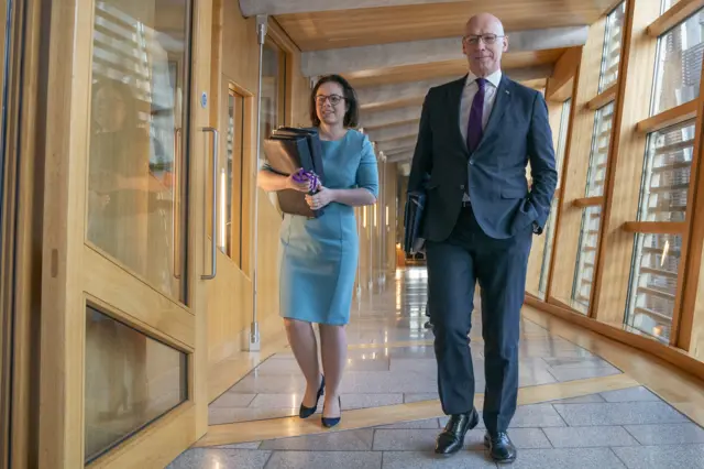 First Minister John Swinney and Deputy First Minister Kate Forbes arrive ahead of FMQs