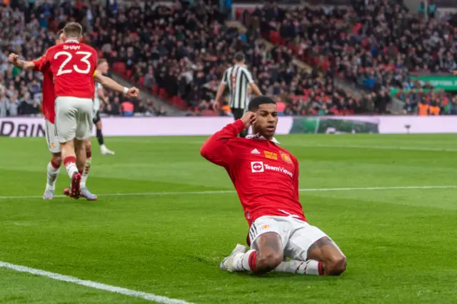 Rashford celebrates after scoring against Newcastle in the EFL Cup final