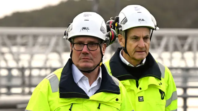 Prime Minister Sir Keir Starmer and Norwegian Prime Minister Jonas Gahr Store wear high-vis jackets and white hard hats