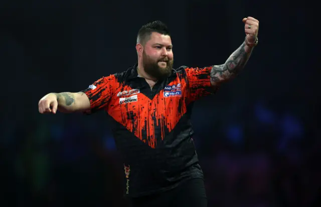 Michael Smith after a nine-darter