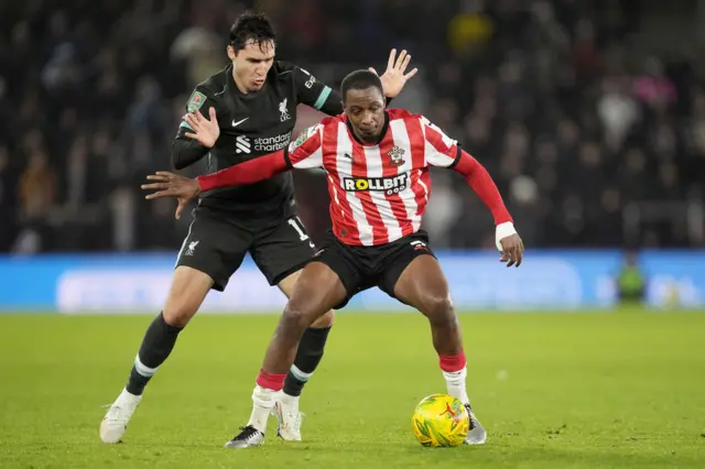 Southampton's Joe Aribo battle for the ball