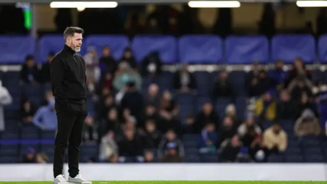 Stephen Bradley looks on