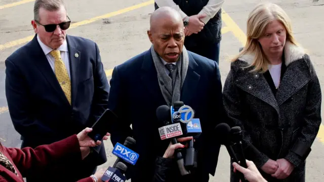 New York Mayor Eric Adams speaks to the press