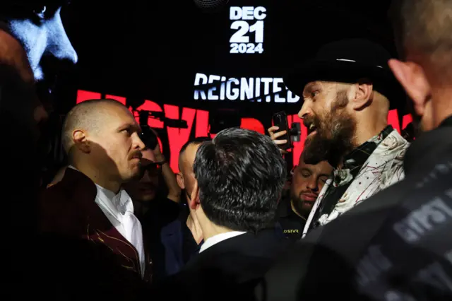 Oleksandr Usyk and Tyson Fury face off