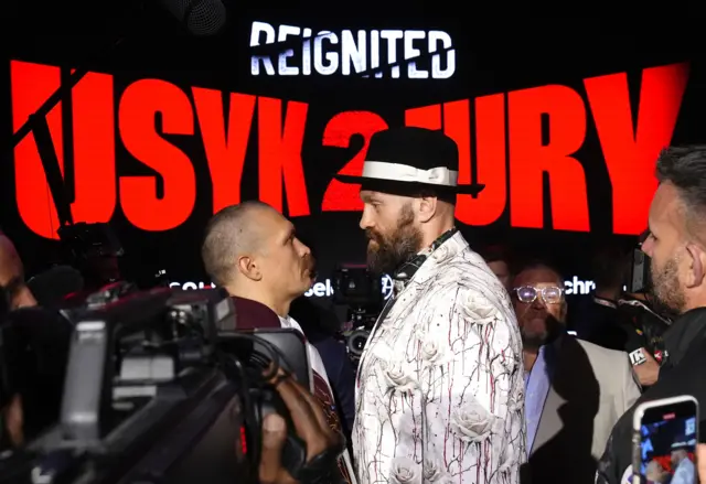 Tyson Fury and Oleksandr Usyk face off