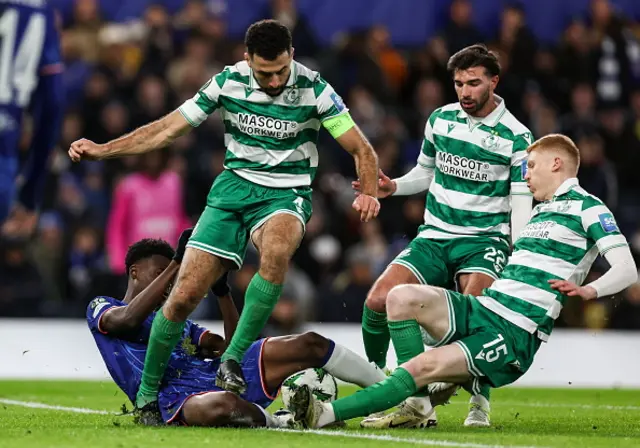 Tyrique George of Chelsea in action against Shamrock Rovers players