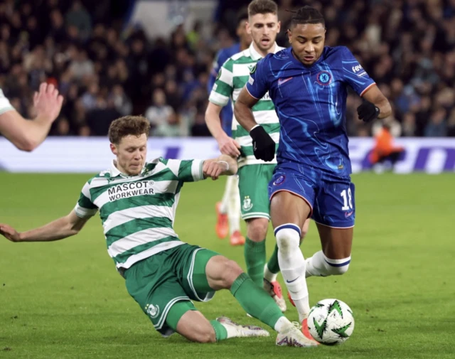 Shamrock Rovers' Markus Poom in action with Chelsea's Christopher Nkunku