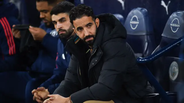 Manchester United head coach Ruben Amorim sat in the dug-out at Manchester City