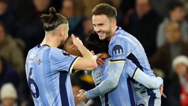 Tottenham players congratulate James Maddison after he scores against Southampton
