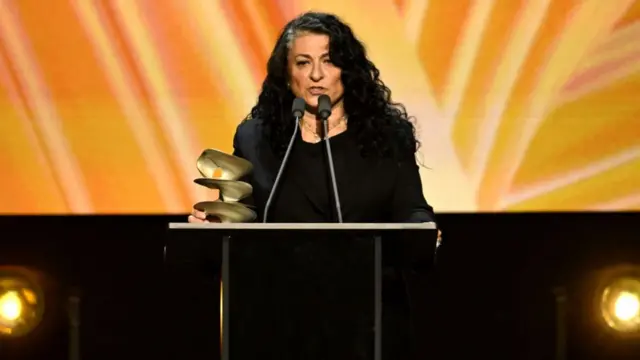 Sophia Neophitou-Apostolou accepting her award