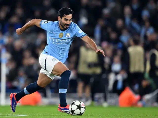 Ilkay Gundogan kicking the ball