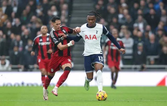 Tottenham Hotspur's Destiny Udogie and Fulham's Sasa Lukic