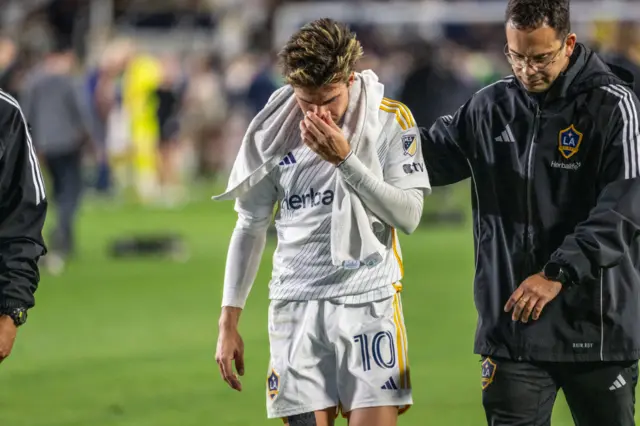 Riqui Puig walks off the pitch at the end of LA Galaxy's MLS Cup victory.