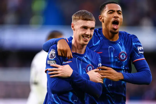 Cole Palmer celebrates scoring a goal for Chelsea against Aston Villa with team-mate Levi Colwill