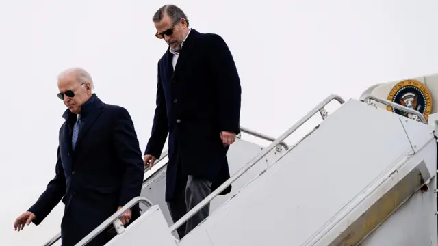 U.S. President Joe Biden and son Hunter Biden disembark from Air Force One at Hancock Field Air National Guard Base in Syracuse