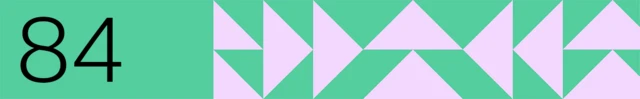 The number 84 is shown on a green background with pink triangles