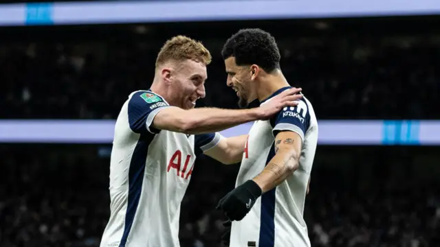 Dejan Kulusevski and Dominic Solanke celebrate