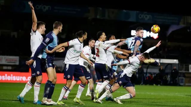 Bolton and Wycombe challenge following a set piece