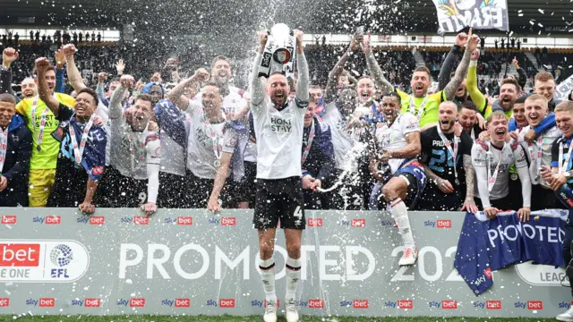 Conor Hourihane celebrates Derby's promotion