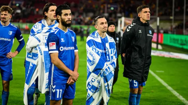 FC Magdeburg players at the end of today's fixture