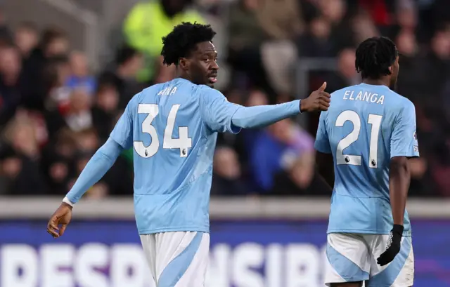 Ola Aina celebrates