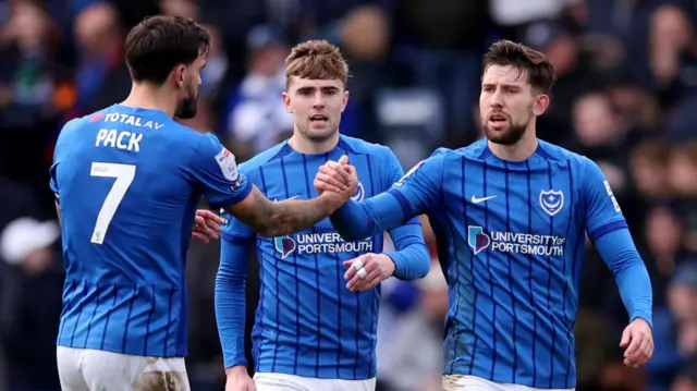 Portsmouth celebrate Callum Lang's second goal against Coventry