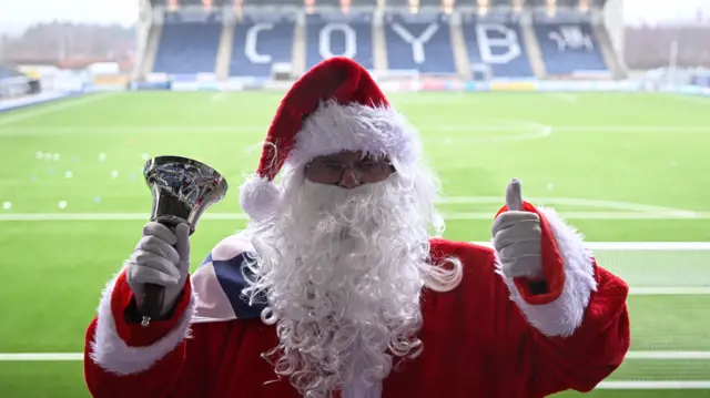 A Falkirk fan dressed as Santa during a William Hill Championship match between Falkirk and Hamilton Academical at The Falkirk Stadium