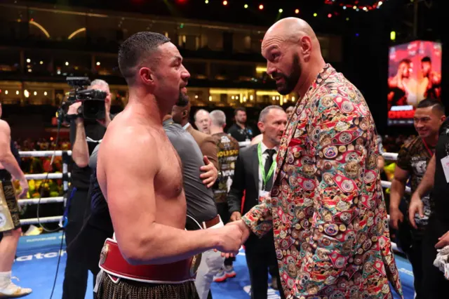 Joseph Parker shaking hands with Tyson Fury