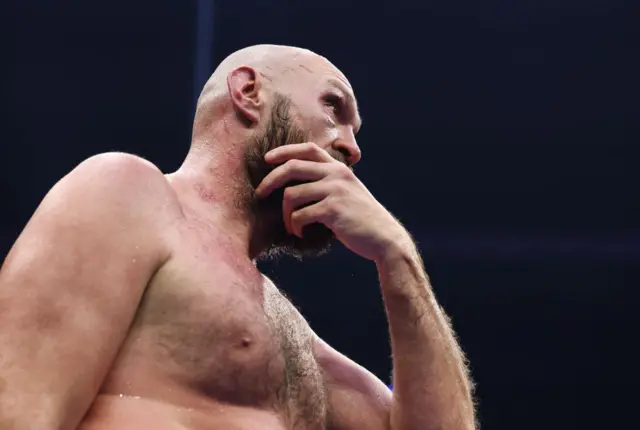 Tyson Fury looks dejected in the ring