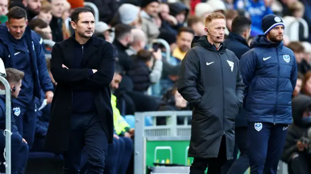 Coventry City boss Frank Lampard looks on