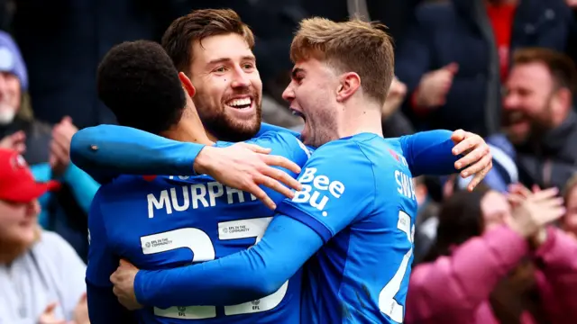 Callum Lang celebrates for Portsmouth