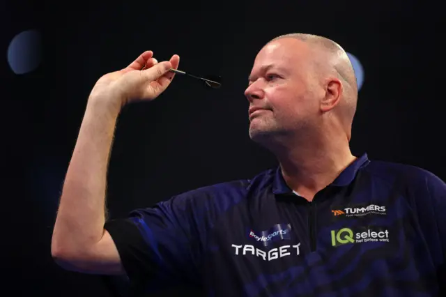 Raymond van Barneveld throwing a dart