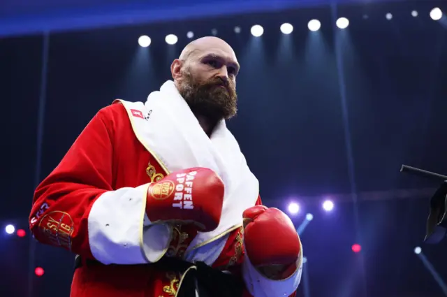 Tyson Fury dressed in red