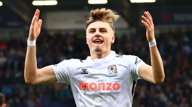 Norman Bassette celebrates scoring for Coventry at Portsmouth