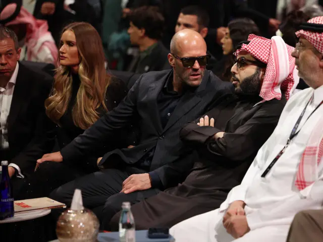 Actor Jason Statham and his wife Rosie Huntington-Whiteley speaks to Chairman of General Authority for Entertainment Turki Alalashikh