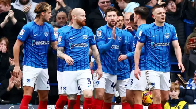 Portsmouth celebrate Callum Lang's equaliser against Coventry