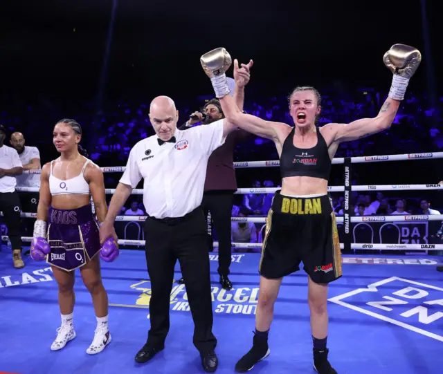 Emma Dolan (black shorts) wins her British and Commonwealth Super-Flyweight Titles contest against Shannon Ryan